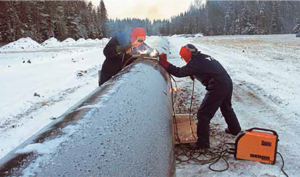 Figure 1: MMA welding on a pipeline.