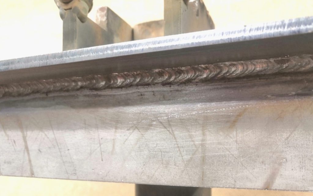 Pulsed MMA welded overhead fillet weld